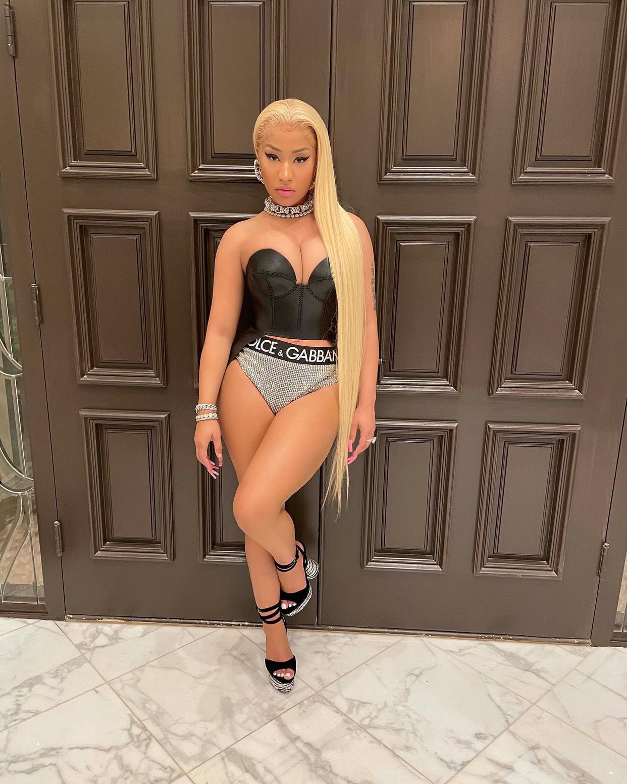Nicki Minaj continues to tease new Collab as she shares photos from Papa Bears first birthday