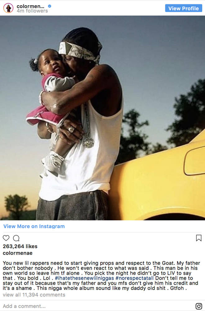 Lil Wayne carrying her daughter 